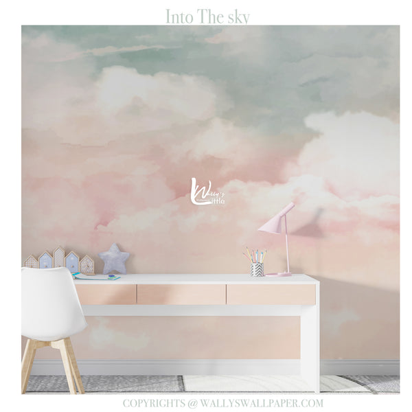 Dreamy watercolor cloud wallpaper mural in pastel pink, peach, ivory, and sky blue tones for a nursery and children's bedroom.