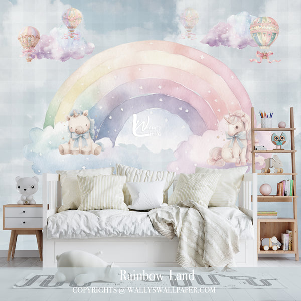 Wallpaper design called "Rainbow Land" featuring a pastel rainbow with clouds, two cute unicorns, and hot air balloons, perfect for kids' rooms and nurseries.