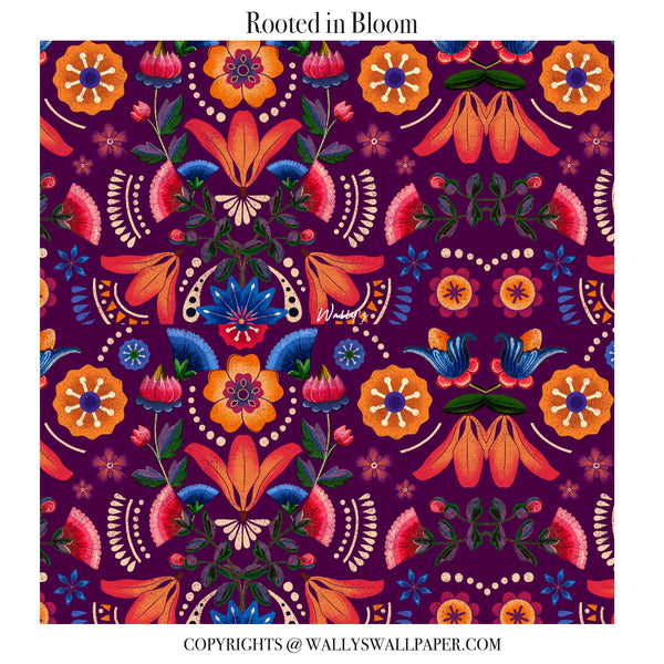 Rooted in Bloom floral wallpaper featuring bold hand-drawn flowers and rich ethnic patterns in red and earthy tones, shown as a rolled wallpaper.”
