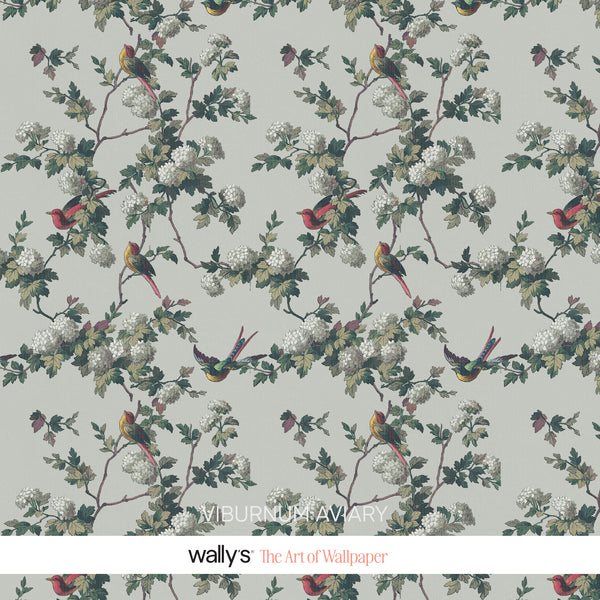 Sage-green wallpaper close-up with white blossoms, green leaves and small birds.
