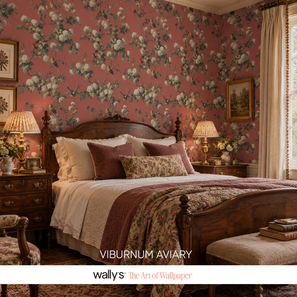 Bedroom with dusty-rose floral wallpaper, dark wood bed and matching nightstands.