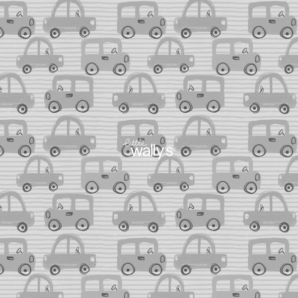Tiny Traffic kids car wallpaper by Little Wally’s featuring hand-drawn orange, blue, mustard and grey cars in a modern children’s bedroom