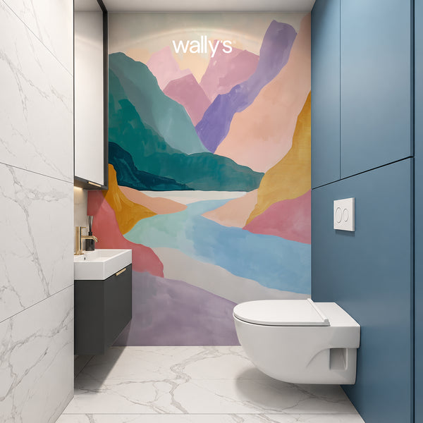 A modern bathroom interior featuring a large colorful abstract mountain and river mural on the back wall. The mural has pastel and saturated tones including pink, purple, teal, blue, yellow, and orange.